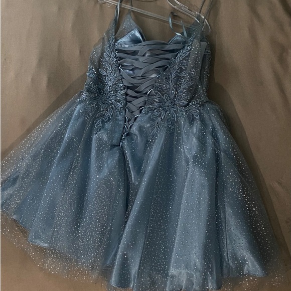 Only wore once for a 15th court. It’s like a smoky blue and Cinderella divine. - Picture 3 of 4